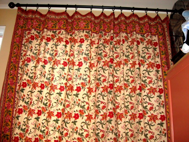floral bedspread and patio door cover