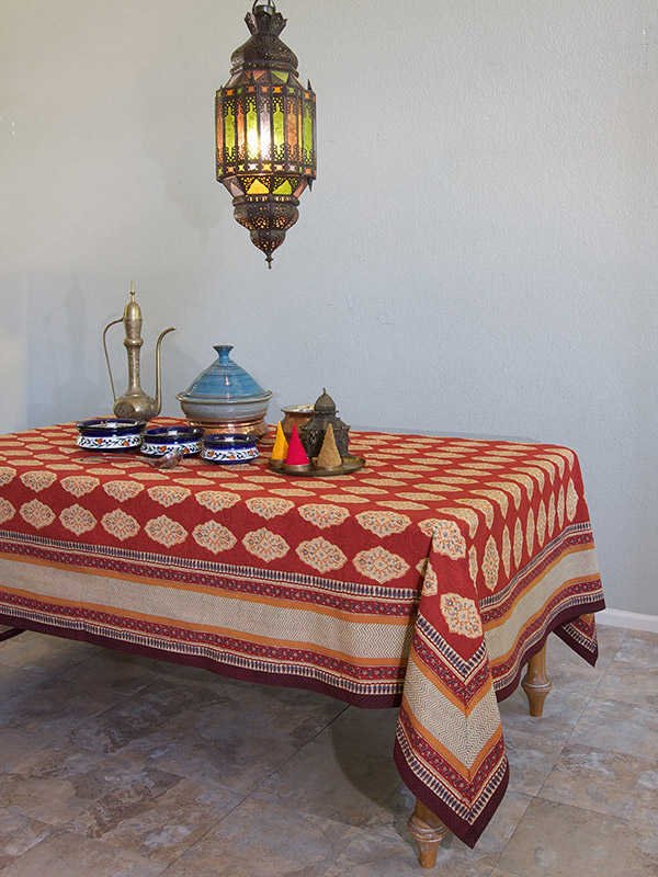 red tablecloth with Moroccan pattern