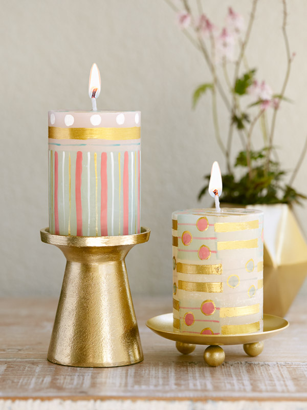 Polka dot paisley hand-painted pillar candles on golden candle holders