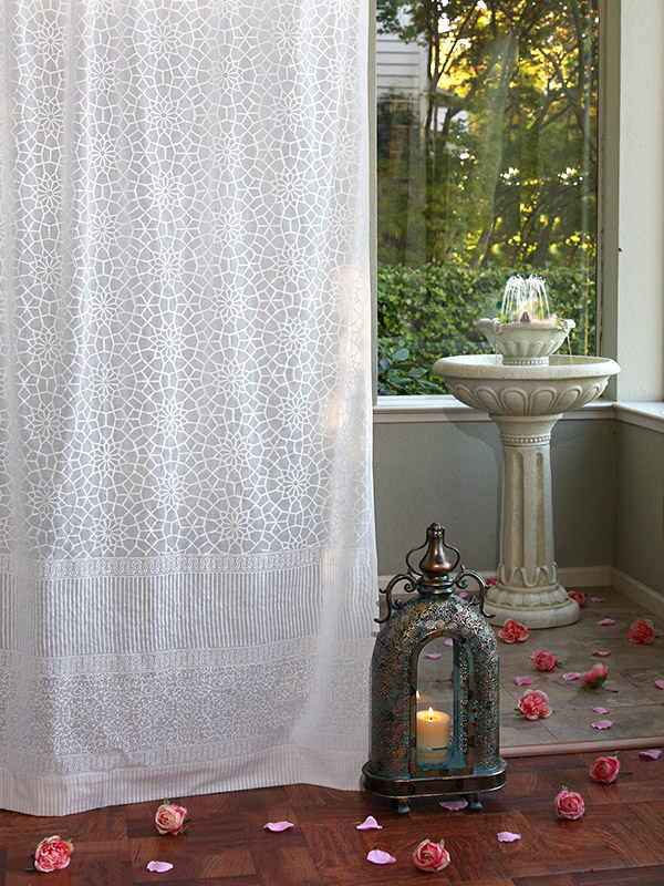 white sheer curtain with pattern for a winter wonderland theme
