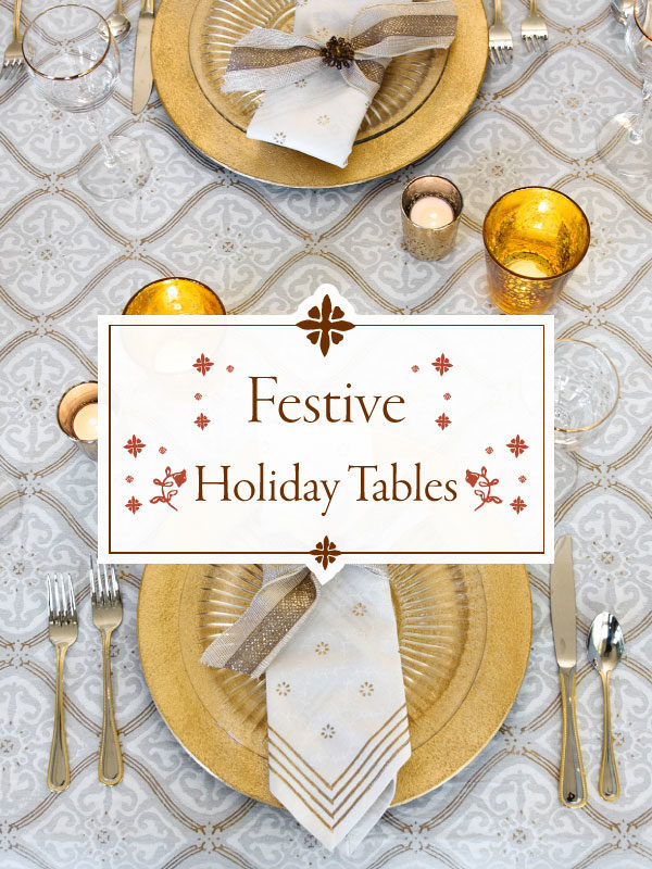 gold and white Christmas tablecloth and table setting