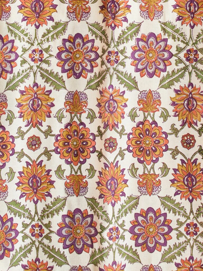 orange, green, and purple vintage floral print