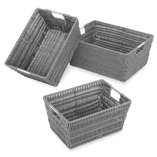 Three gray wicker baskets