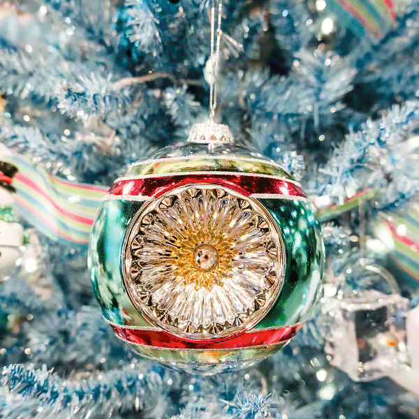 Gif of vintage European glass ornaments, stars, and snowflakes for Christmas tree skirt inspirations