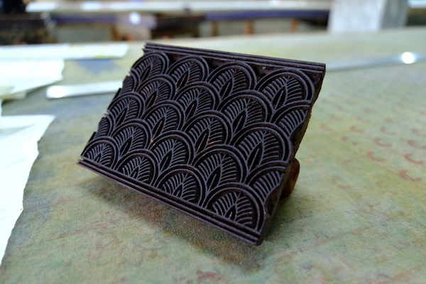 Photograph of a scale wooden block pattern