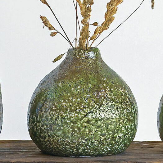 Green vase to show what can look good with white decor