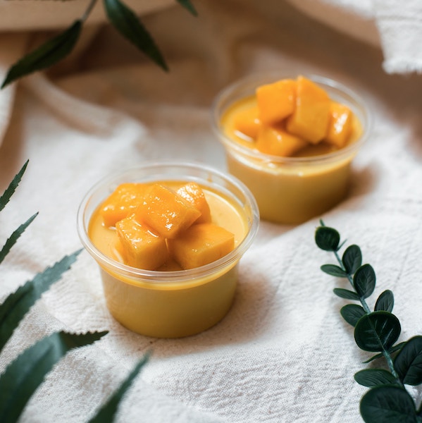 Photograph of a mango sorbet to illustrate summer colors inspired by Pantone's "Iced Mango" shade