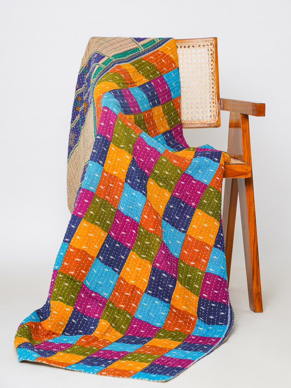 Modern boho style throw quilt for a colorful, authentic home