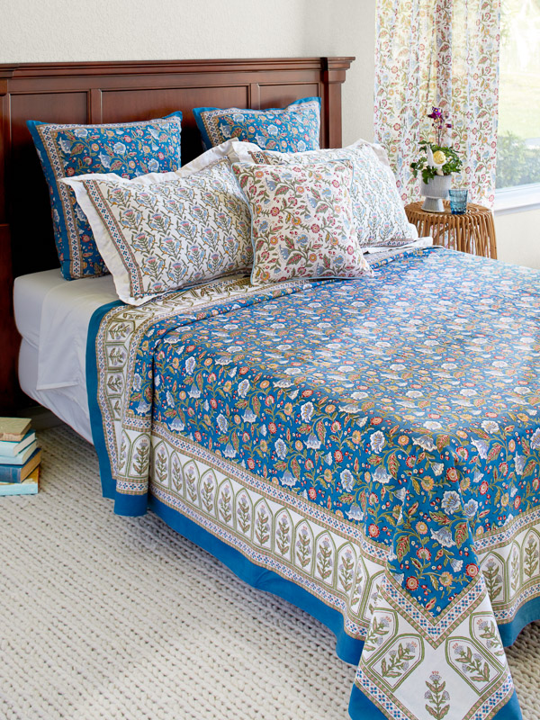 Blue floral bedspread in Provincial French pattern