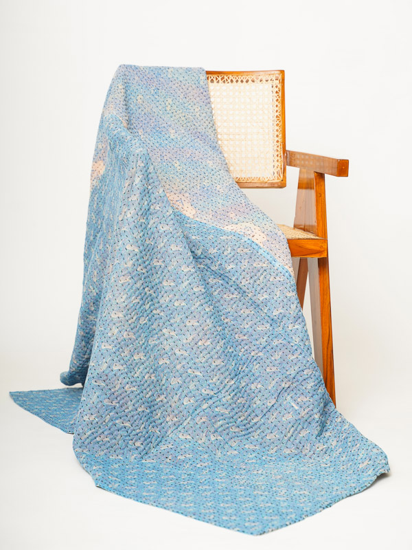 How to style a calming kid's room using linens such as a soft cotton throw
