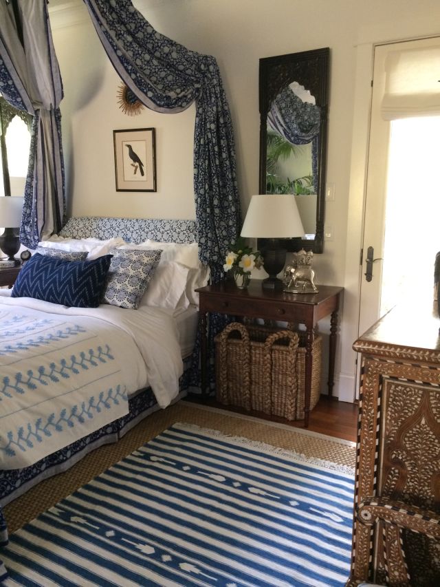 blue and white bedroom with Indian decor